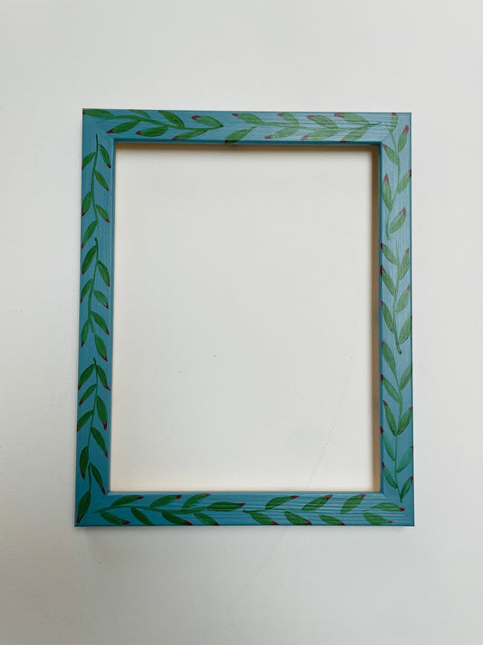 hand-painted frame – green leaves on blue