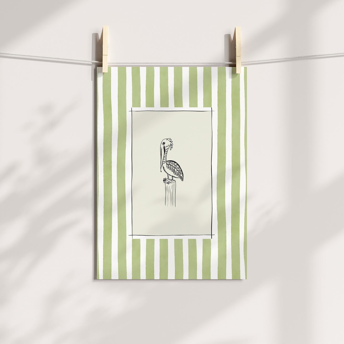 pelican on pole with light green watercolour striped surround - birds art print by cat dearlove
