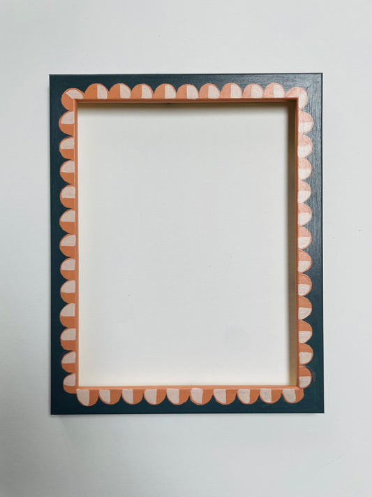 hand-painted frame – orange scallops on black