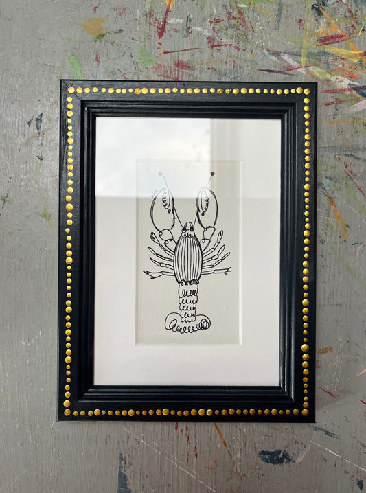 ready to hang – lobster in mount – railings frame with gold finish - by cat dearlove